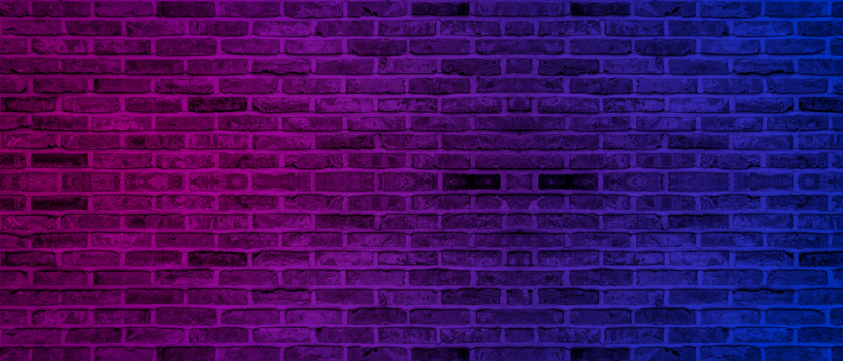Lighting effect neon light on brick wall texture